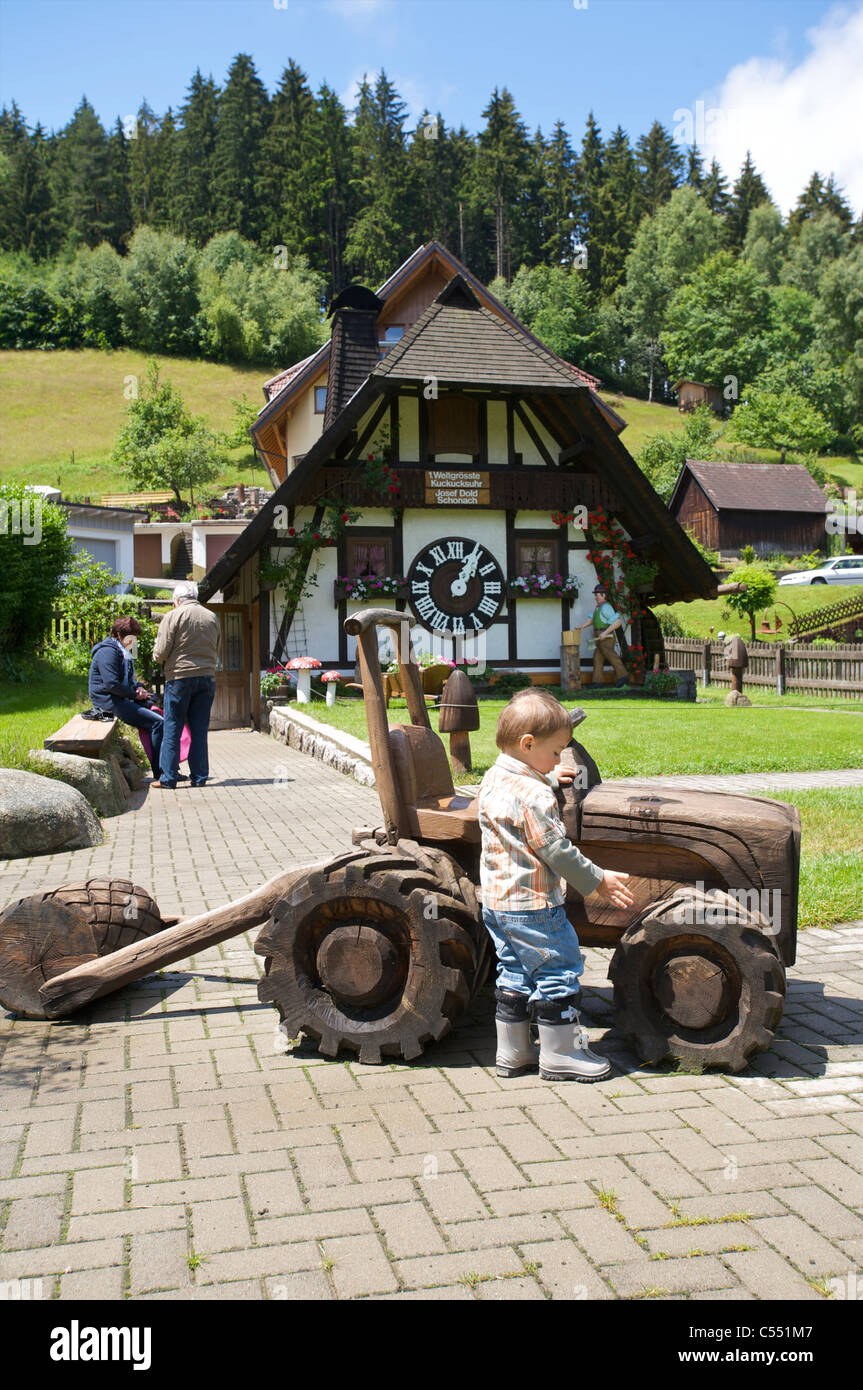 People visiting he world's largest cuckoo clock, Schonach in the Schwarzwald, BadenWurttemberg