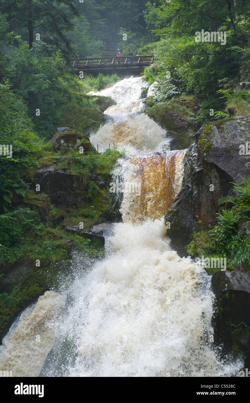 People visiting the highest waterfall in Germany in Triberg, Black Forest, Baden-Wurttemberg Stock Photo