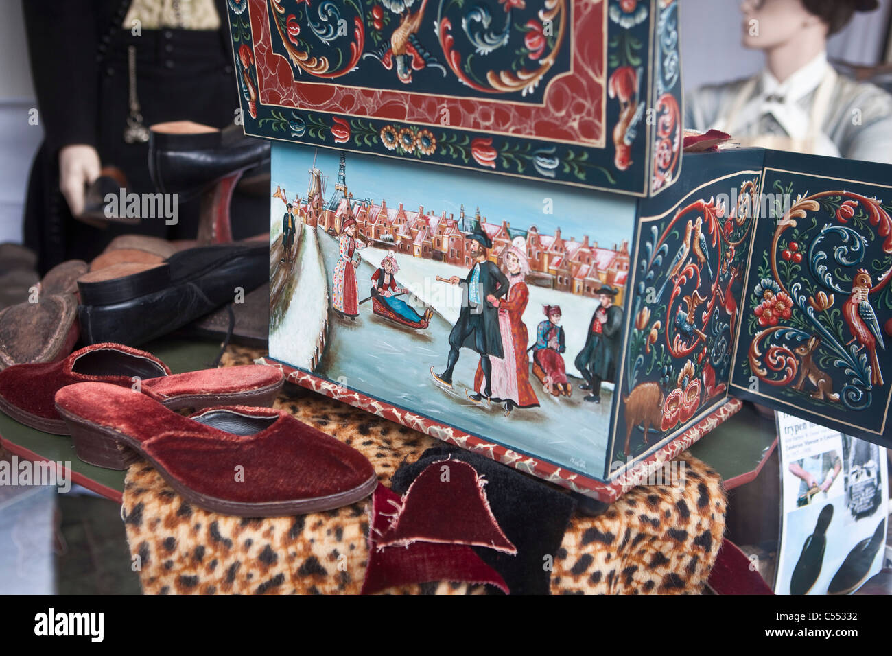 The Netherlands, Hindeloopen, Dutch capital of ice skating culture. Painting on wooden box in Skating or Skate Museum. Stock Photo