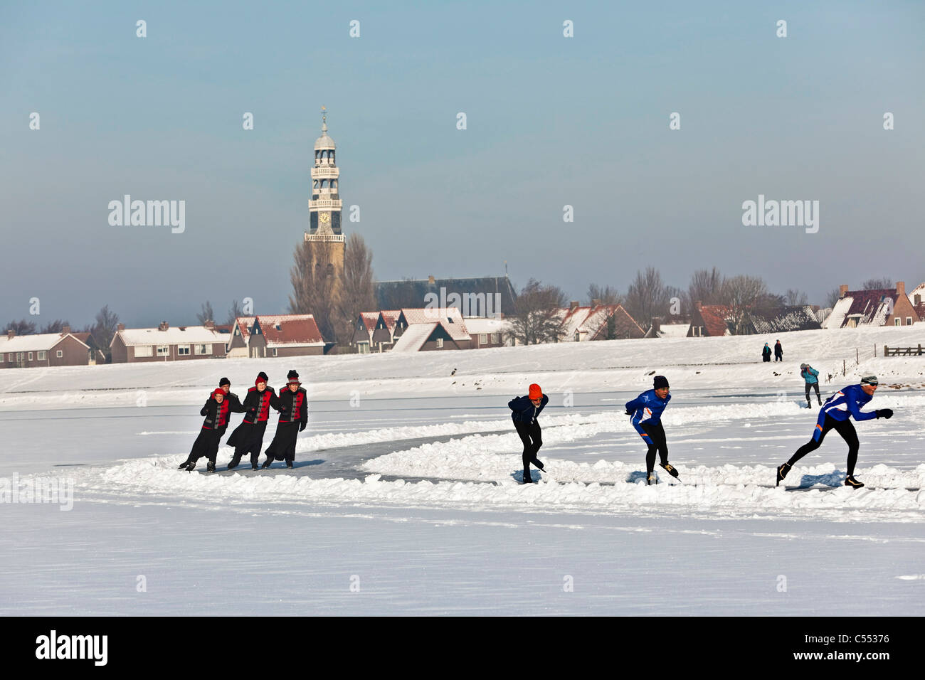 The Netherlands, Hindeloopen. Ice skating and figure skating or gliding on lake called