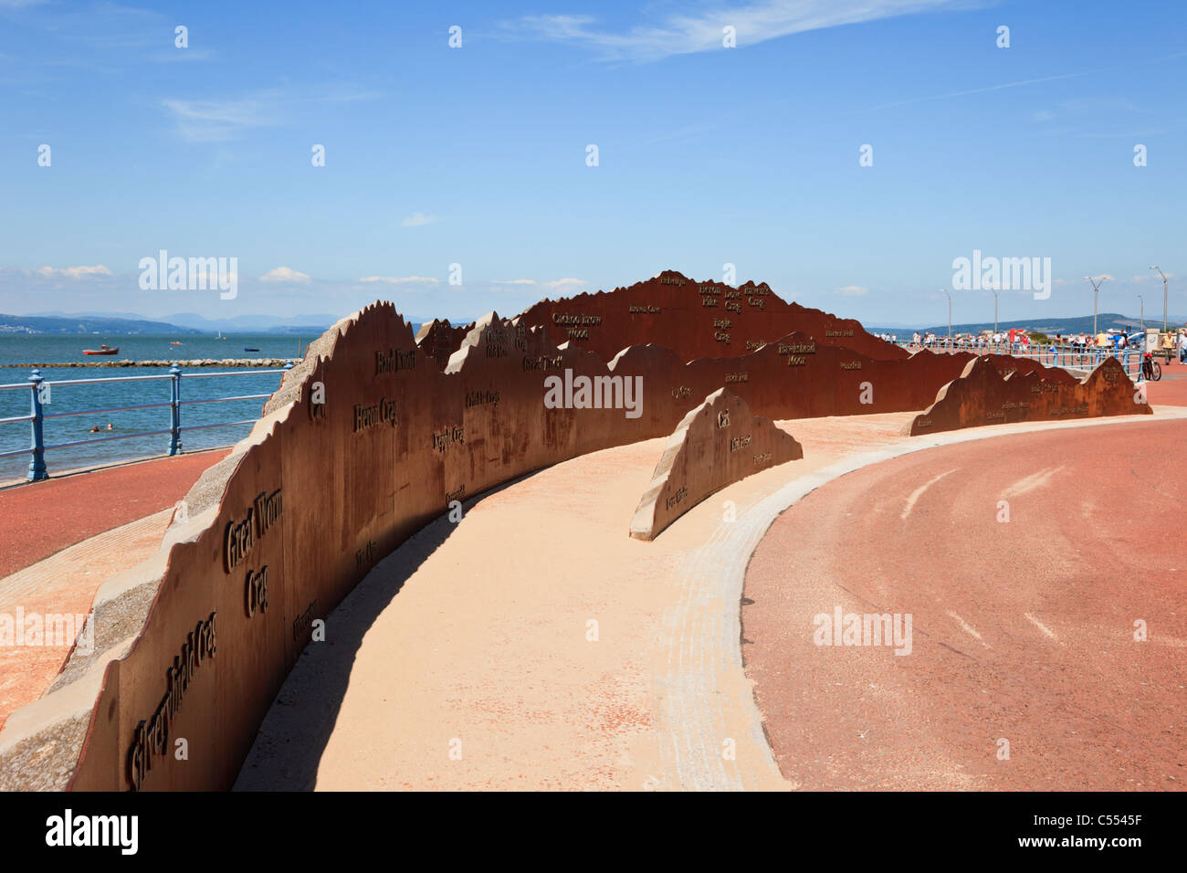 Panorama steel sculpture of Lake District mountains outline on seafront