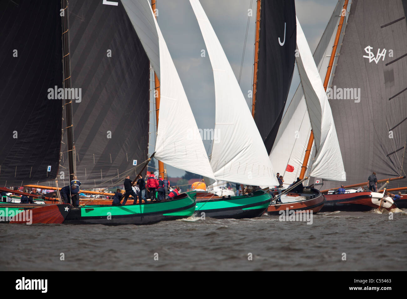 The Netherlands, Elahuizen, Sailing races called Skutsjesilen, with traditional flat bottomed cargo boats called Skutsjes. Stock Photo