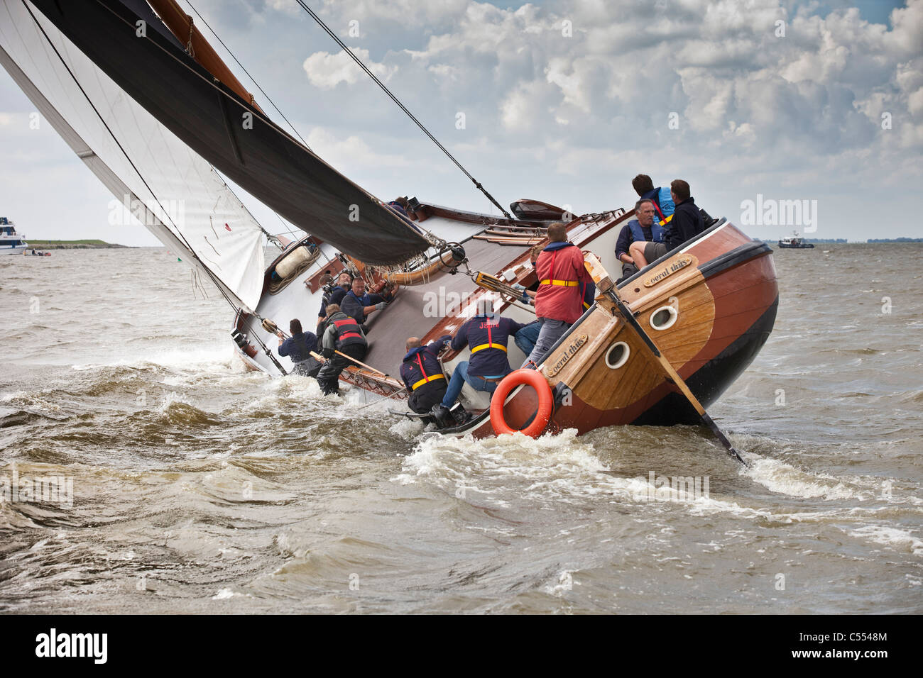 The Netherlands, Lemmer, Sailing races called Skutsjesilen, with traditional flat-bottomed cargo boats called Skutsjes. Stock Photo