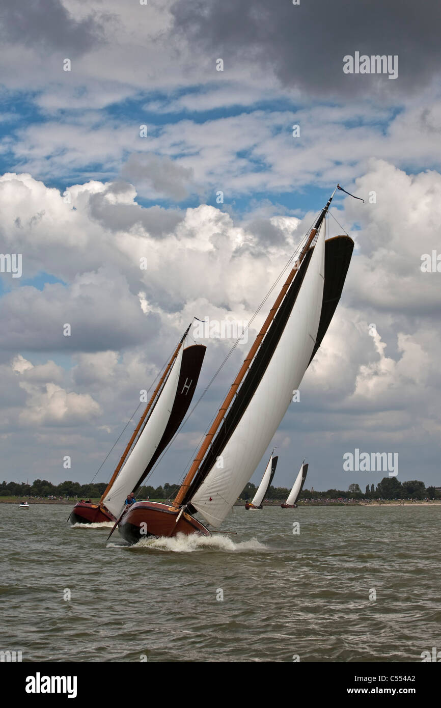 The Netherlands, Lemmer, Sailing races called Skutsjesilen, with traditional flat bottomed cargo boats called Skutsjes. Stock Photo