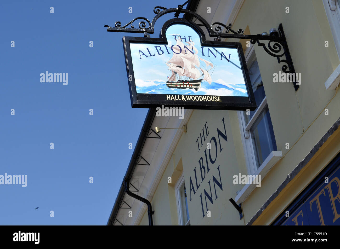 The Albion Inn pub sign, Wimborne Minster, Dorset, showing a battleship of the Nelson era at sea. Stock Photo
