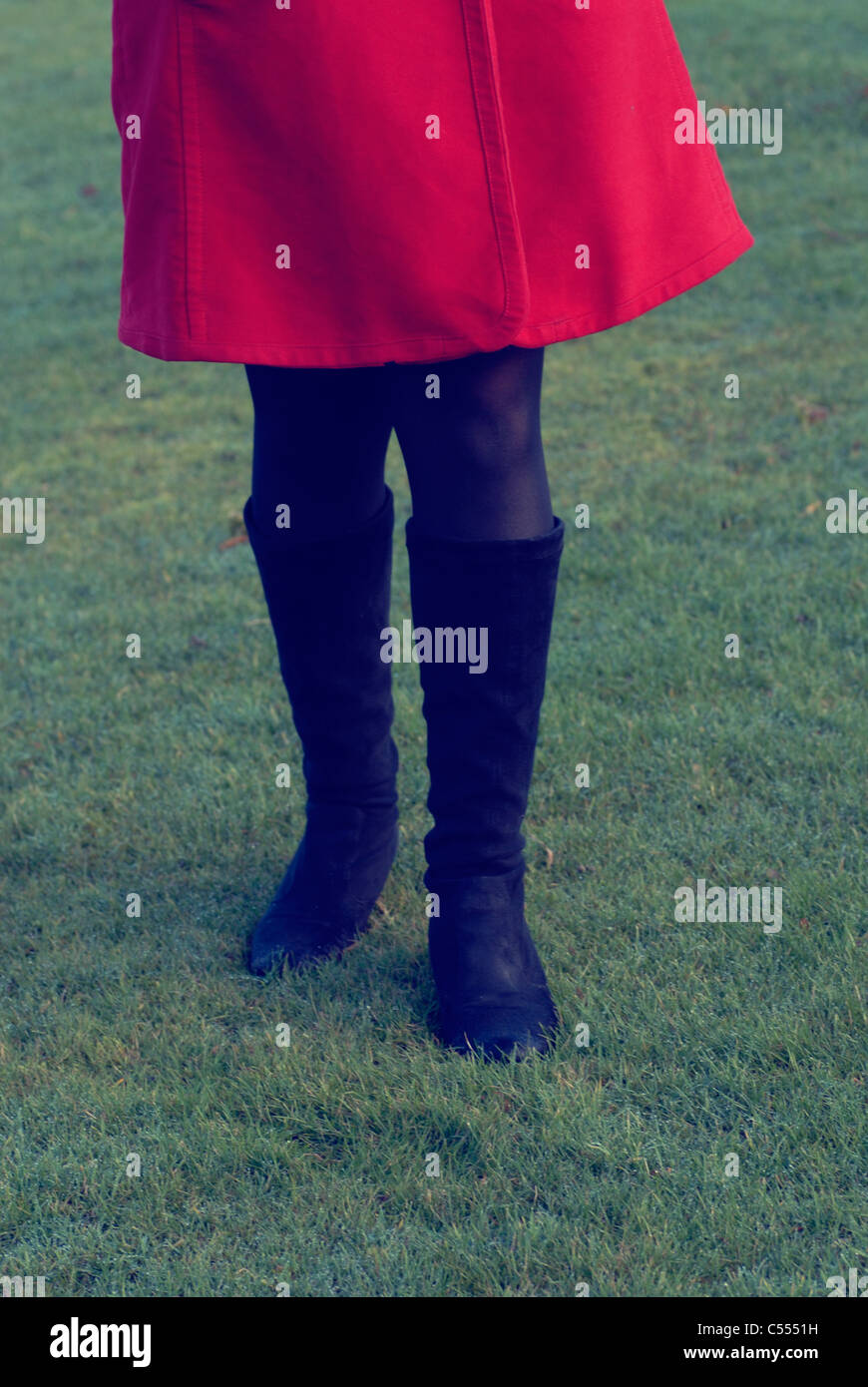 Woman in black boots walking hi-res stock photography and images - Alamy