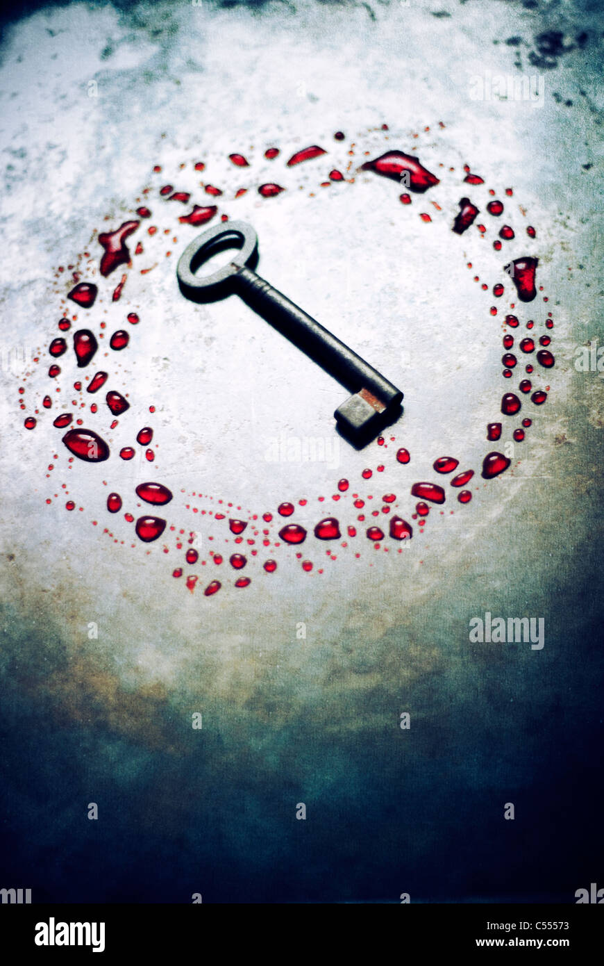 Old rusted key in a circle of blood Stock Photo Alamy