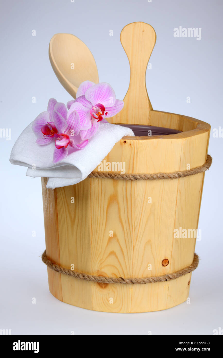 Wooden sauna bucket with spoon Stock Photo