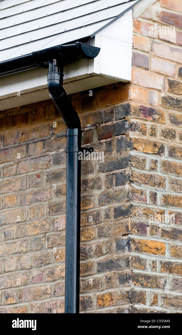 New guttering and drainpipe Stock Photo