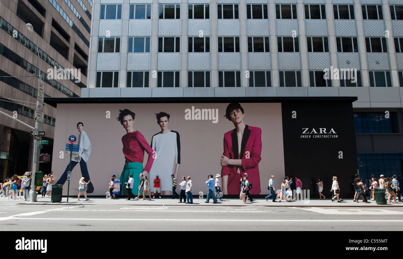 A billboard on a construction shed on Fifth Avenue in New York announces  the eminent arrival of a Zara clothing store Stock Photo - Alamy