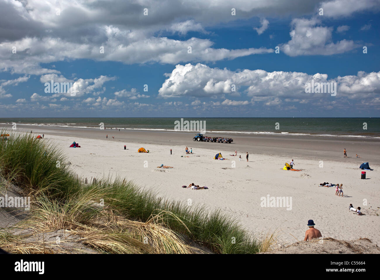 The Netherlands, Buren, Ameland Island, belonging to Wadden Sea Islands. Unesco World Heritage Site. People on beach. Stock Photo