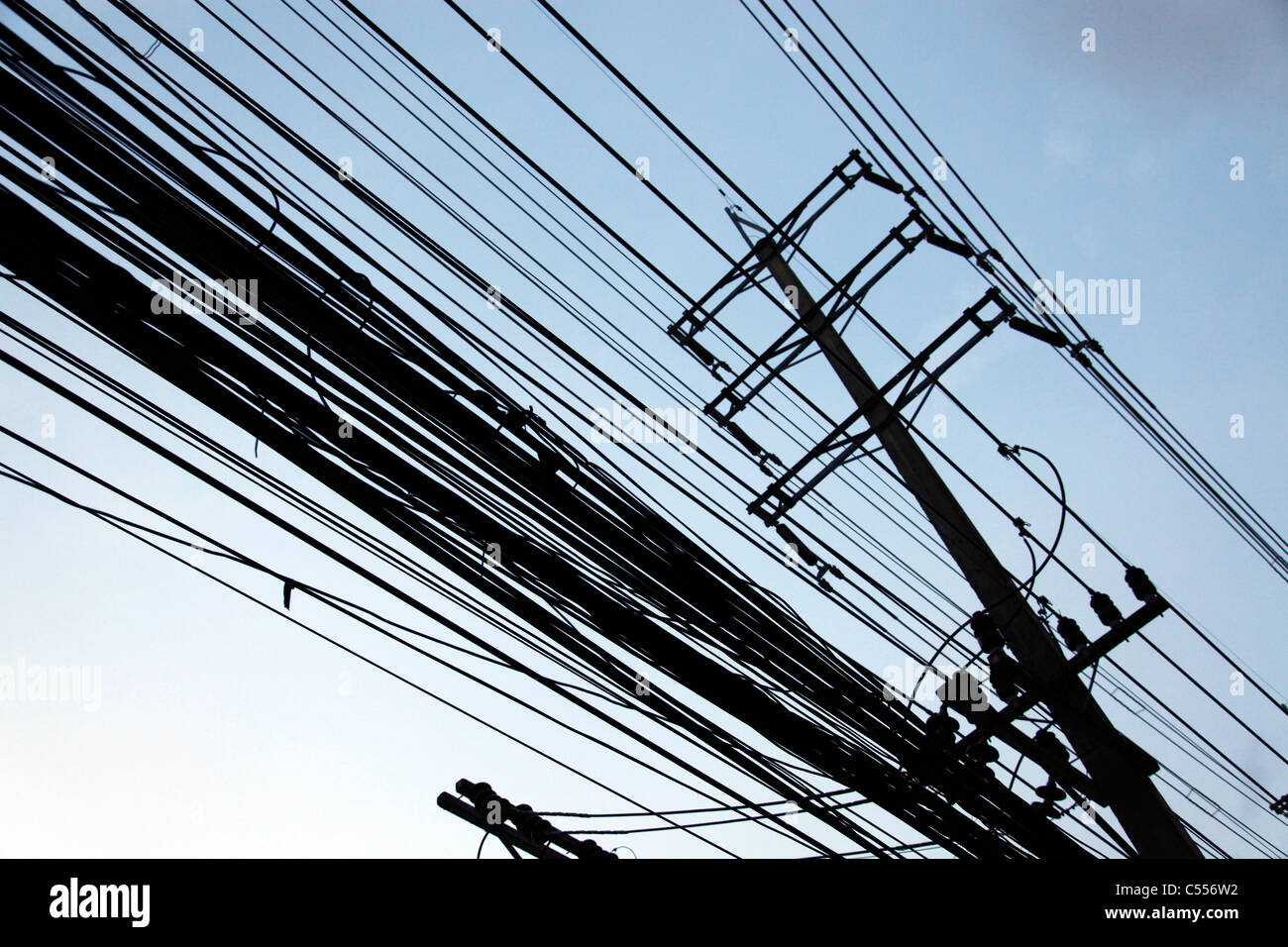 Telegraph poles and dangerous tangled mass of electricity wires and