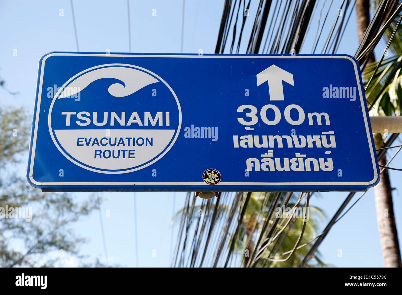 Tsunami evacuation route sign in Patong, Phuket, Thailand Stock Photo