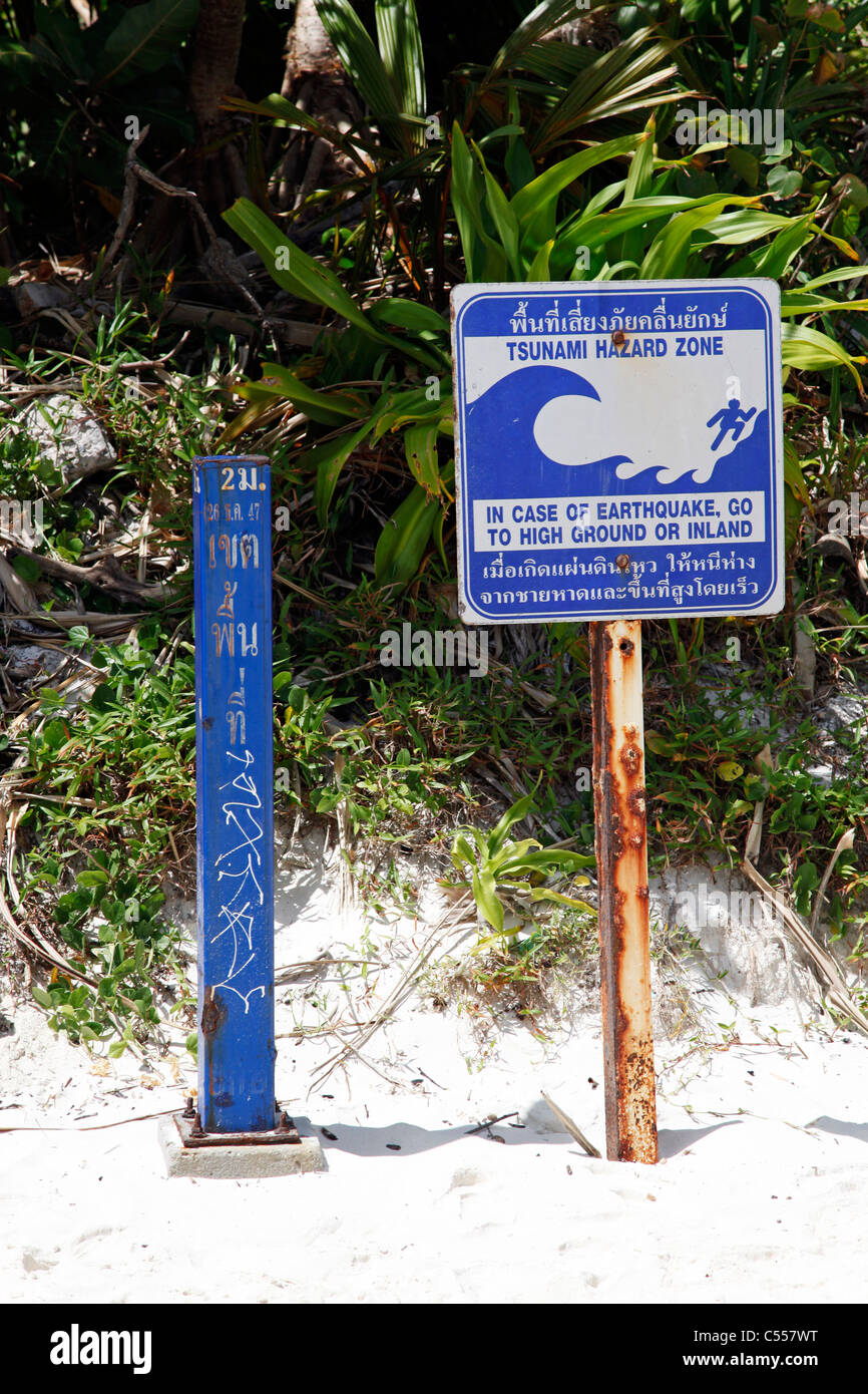 Tsunami hazard zone warning sign on Maya Bay where The Beach was filmed, Ko Phi Phi Ley, Phuket, Thailand Stock Photo