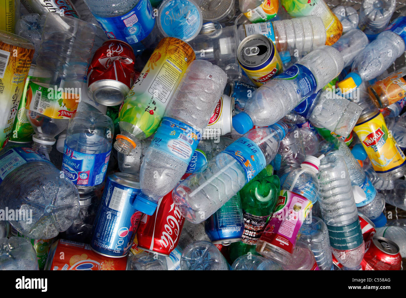 Plastic bottles and containers in a rubbish bin for recycling in Phuket