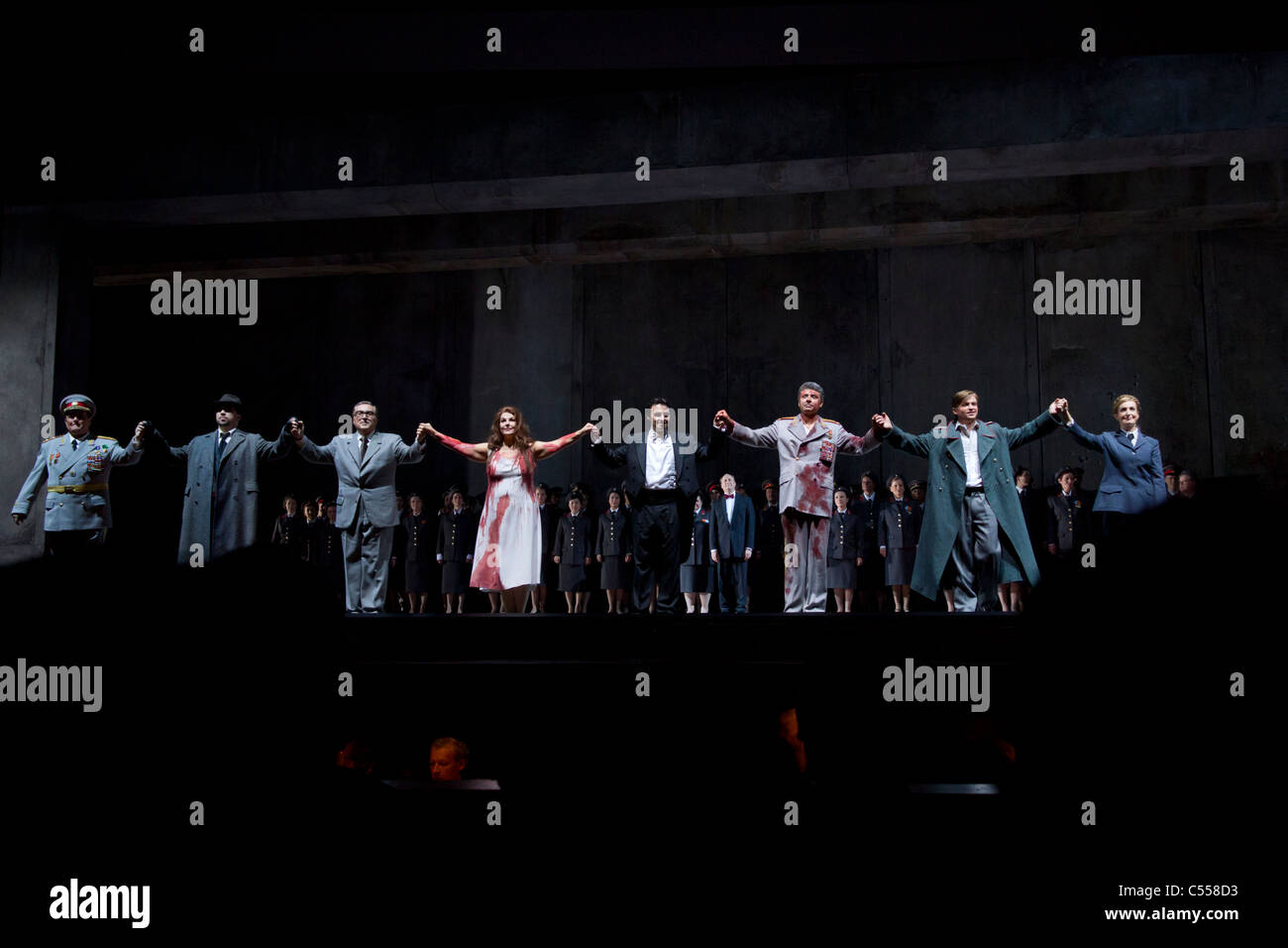 curtain call of conductor with cast at performance of Verdi's Macbeth at the Deutsche Oper, Berlin, Germany Stock Photo