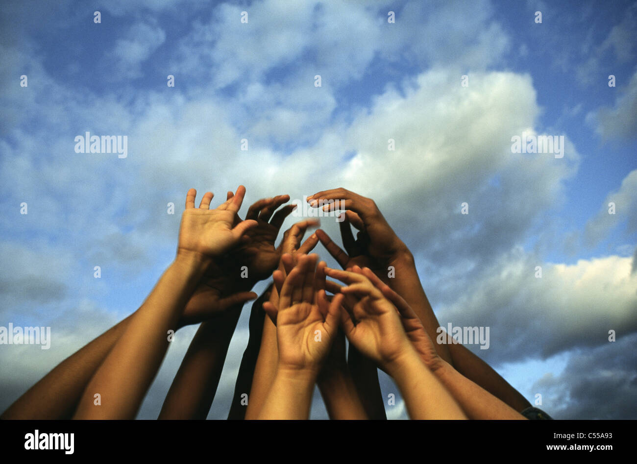 Hands reach for the clouds hi-res stock photography and images - Alamy