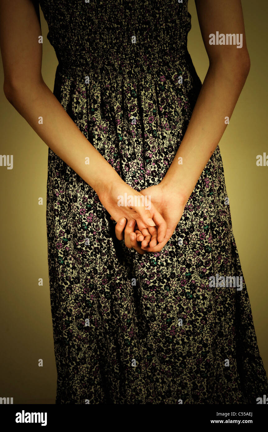 Young Woman Hands Behind Her Back Stock Photo Alamy