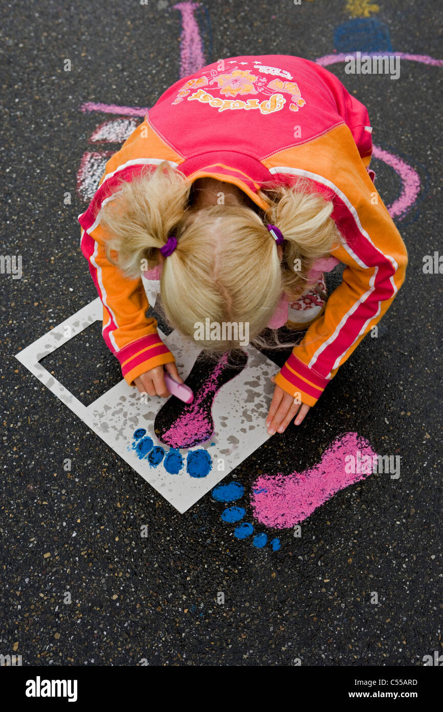 The Netherlands, Nijmegen. Four-Day Walk. Child painting footprint. Stock Photo