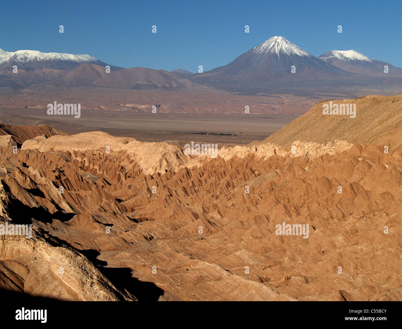 Valle de Muerte,Vulcan Lincancabur and Juriques, San Pedro de Atacama,Chile Stock Photo