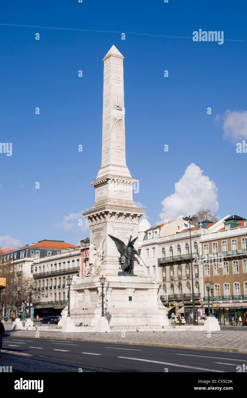 Obelisk in front of buildings, Praca dos Restauradores, Lisbon ...