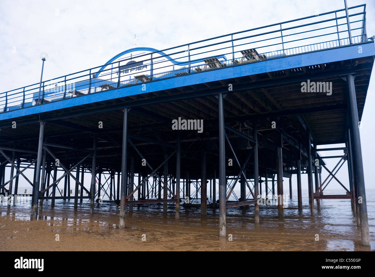 Steel Girders, Legs and Structural Supports of The Pier Exposed at Low