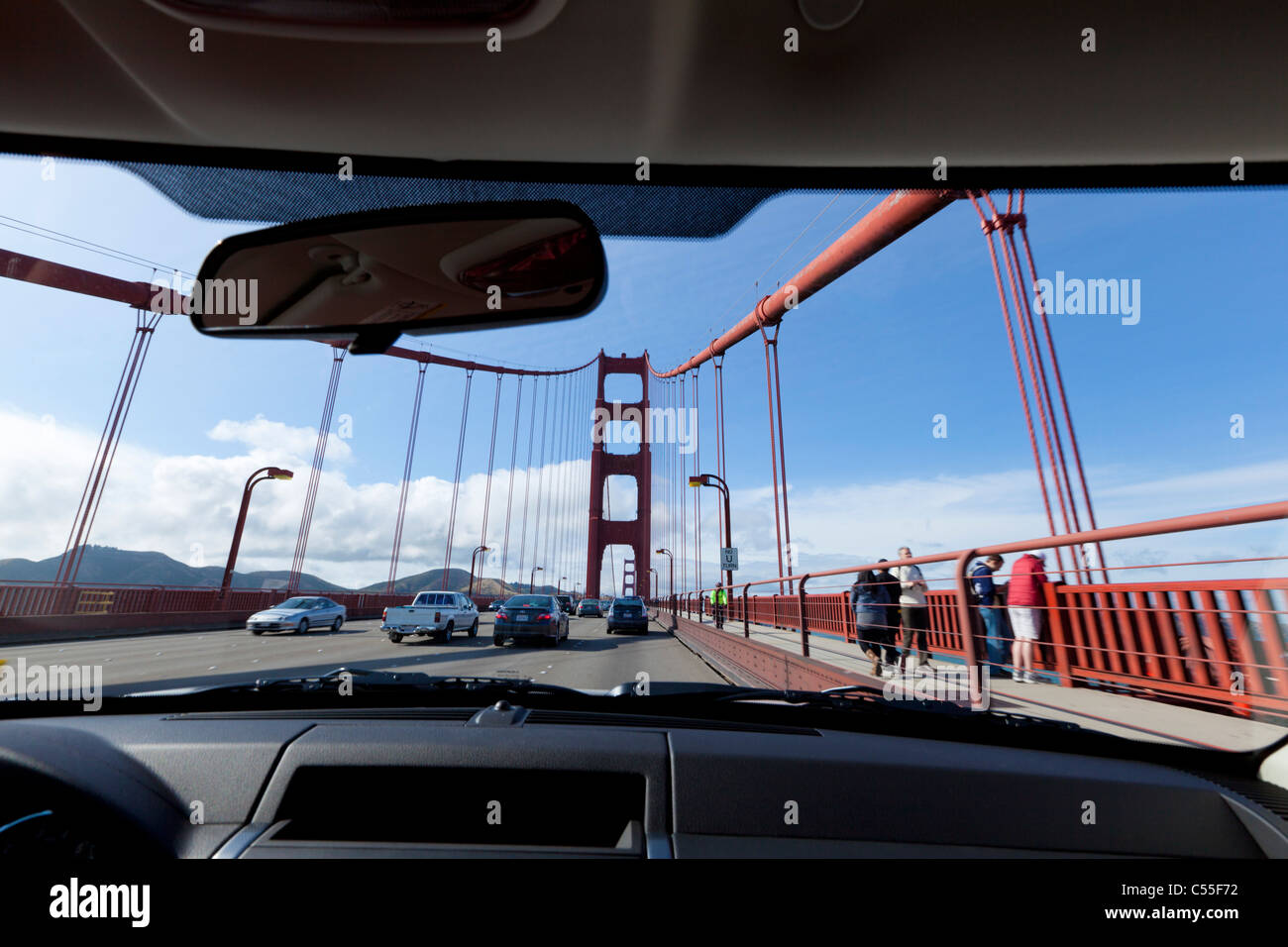 view through car windshield driving across The Golden Gate Bridge San Francisco California United states of america USA Stock Photo