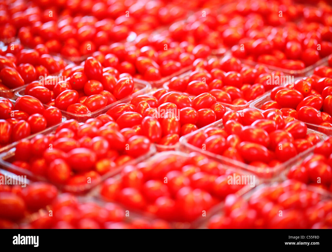 Cherry tomatoes at a market stall Stock Photo - Alamy