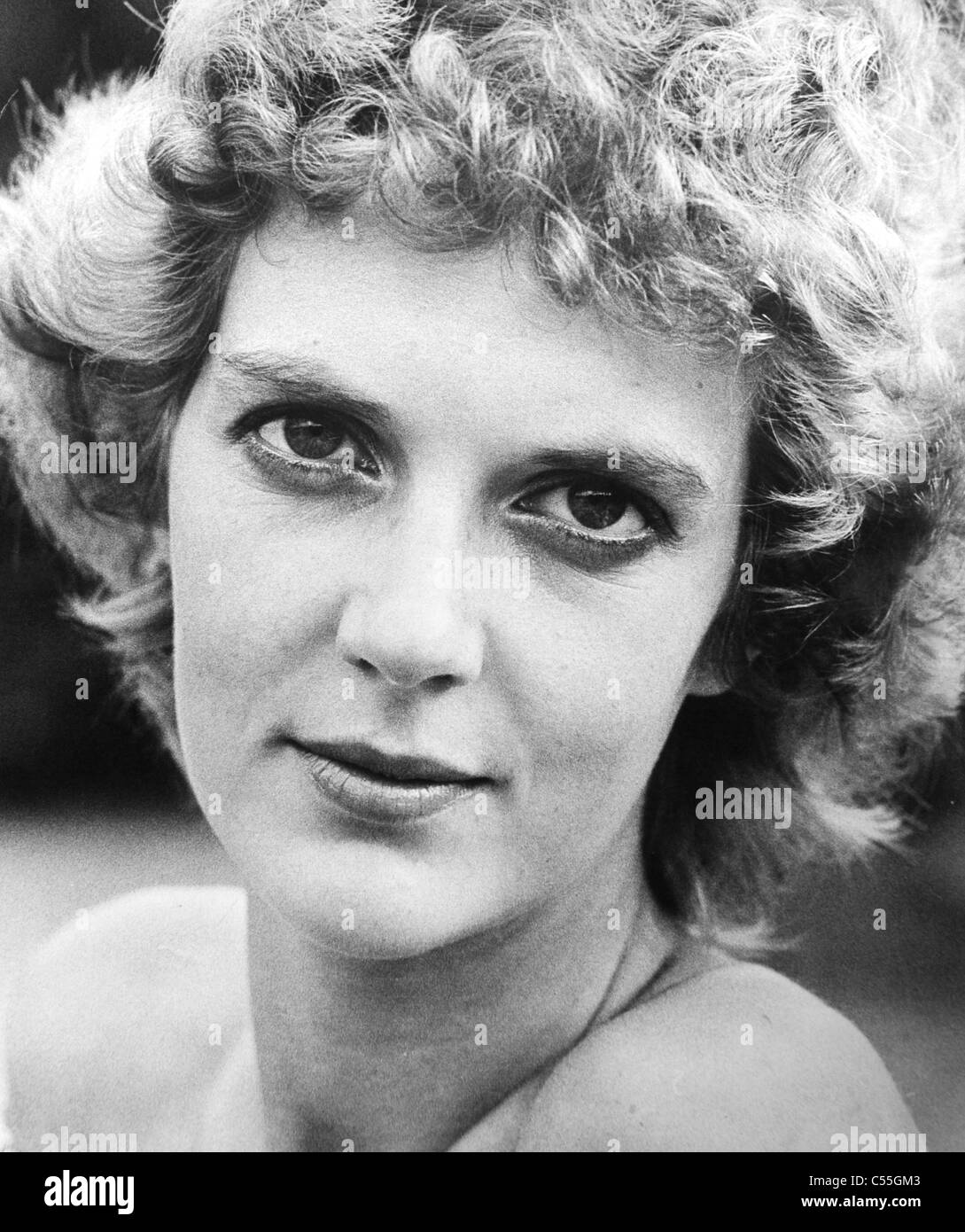 Young woman in her early 20s with short cropped blonde hair for fashion shoot 1979 Stock Photo