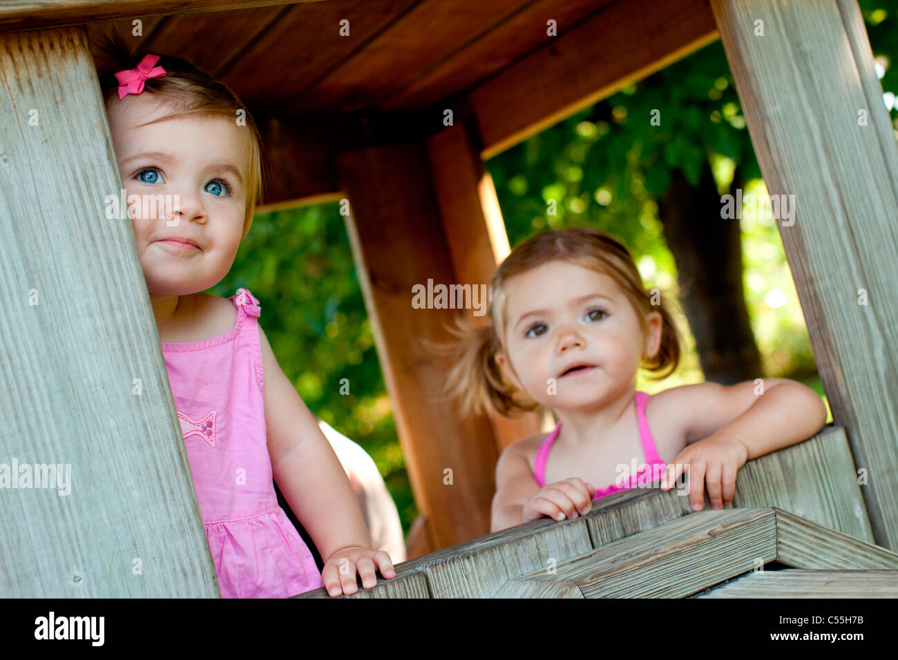 Baby Girls In A Cabin Traverse City Grand Traverse County Stock