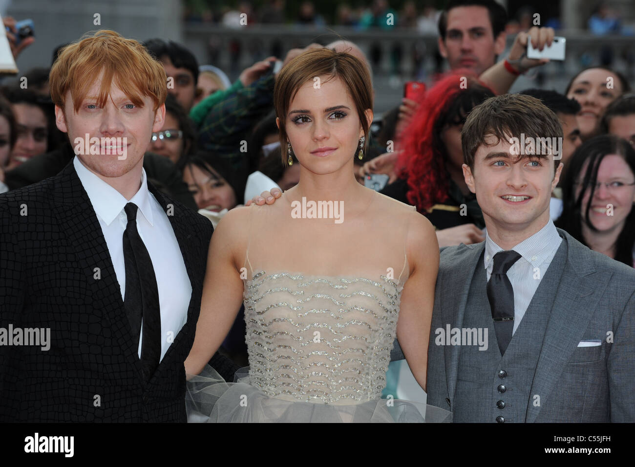 RUPERT GRINT EMMA WATSON & DANIEL RADCLIFFE HARRY POTTER AND THE DEATHLY HALLOWS - PART 2 - WORLD PREMIERE TRAFALGAR SQUARE LO Stock Photo