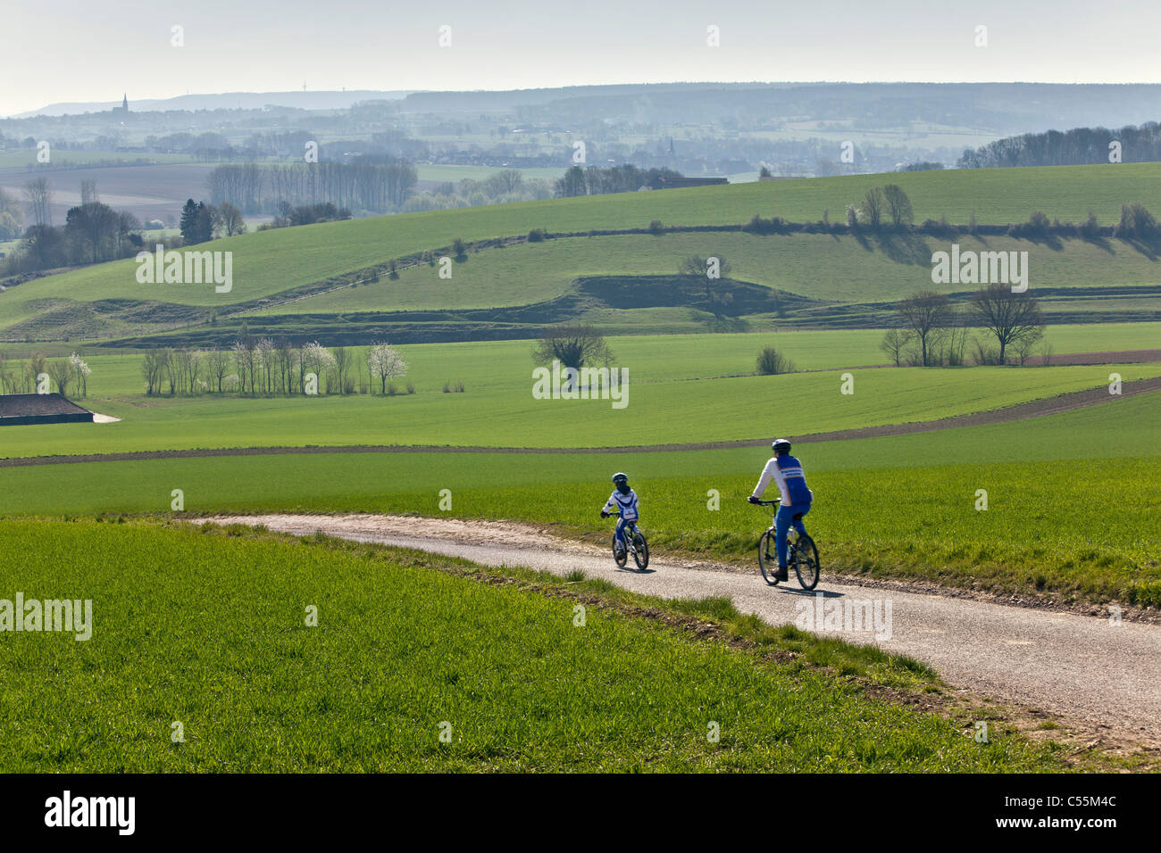 The Netherlands, Gulpen. Cyclists, father and son, taking part in tourversion of Amstel Gold Race 2010 Stock Photo