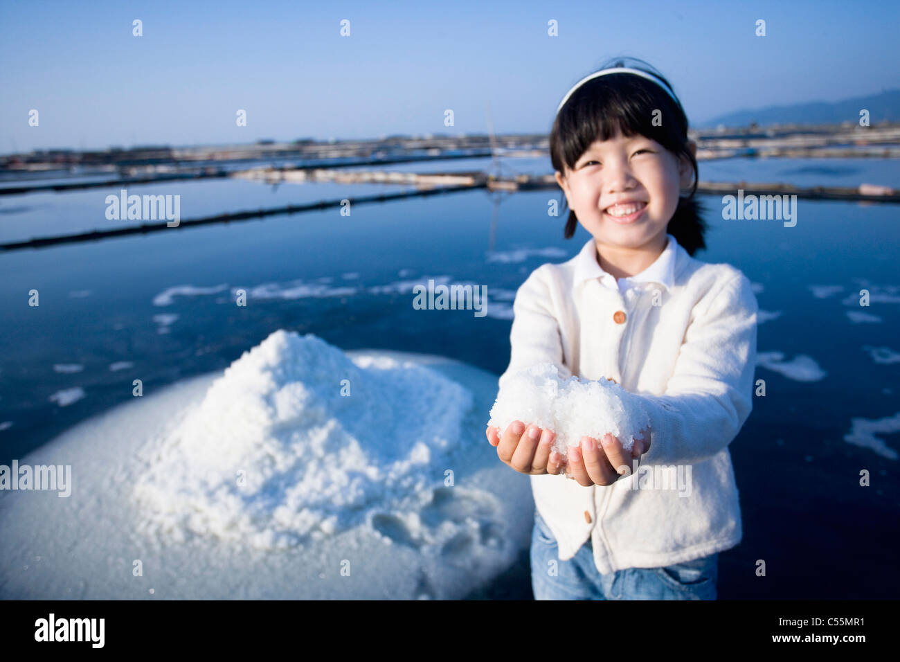Woman Using Salt girl put salt on her hands Stock Photo - Alamy