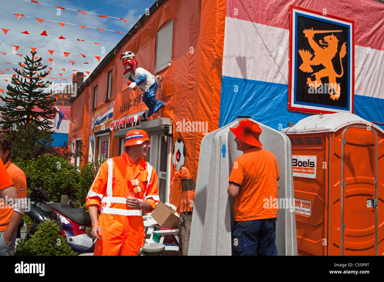 The Netherlands, Goirle, Orange decorated street Irene Straat. Celebrating victory over Japan during World Cup Football 2010. Stock Photo