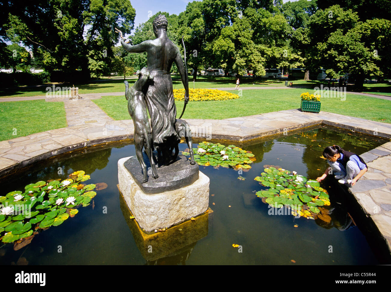 Curious girl exploring Fitzroy Gardens in Melbourne Stock Photo