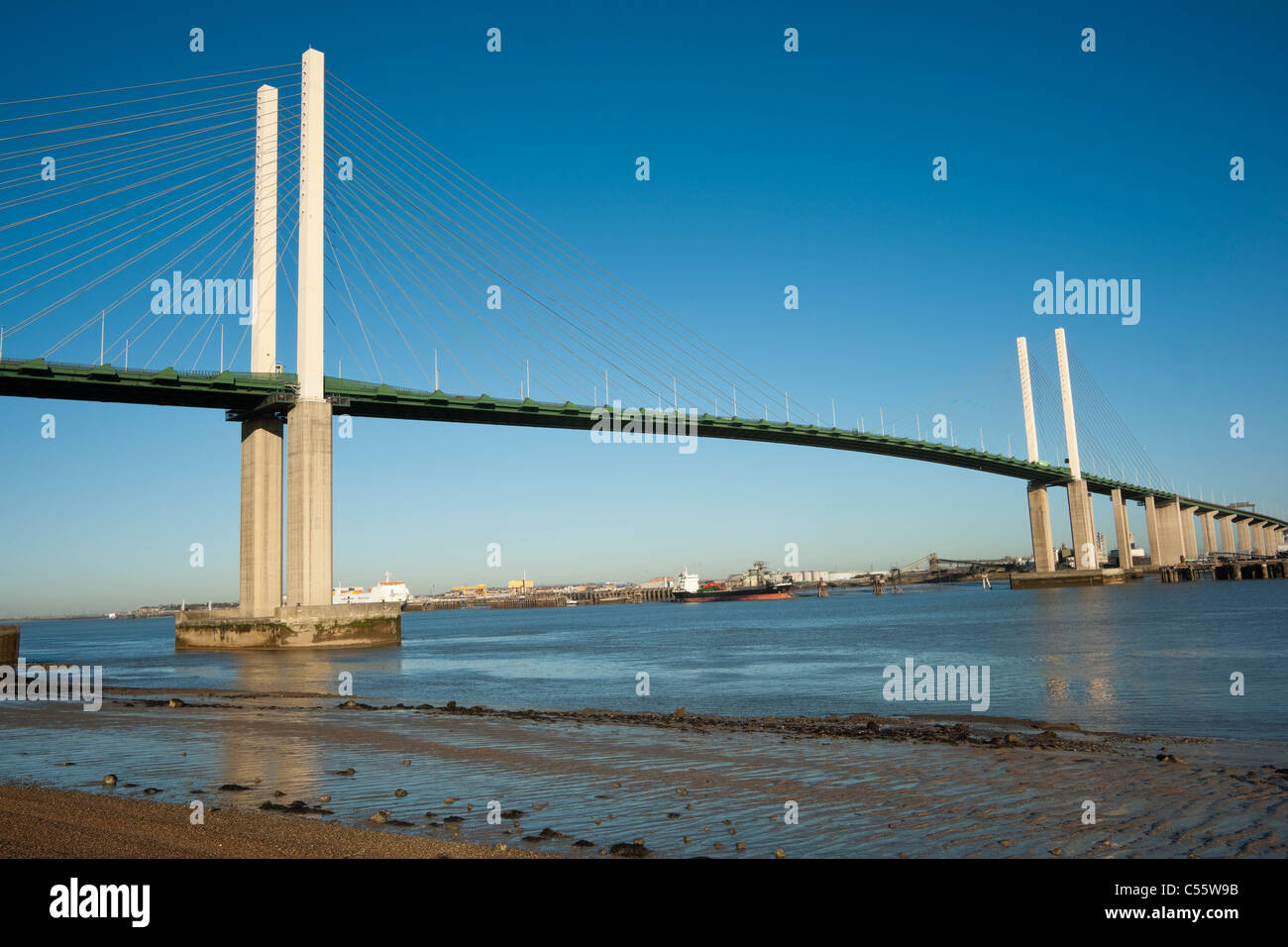 Queen Elisabeth II bridge over the river Thames, in West Thurrock, UK against a clear blue sky Stock Photo
