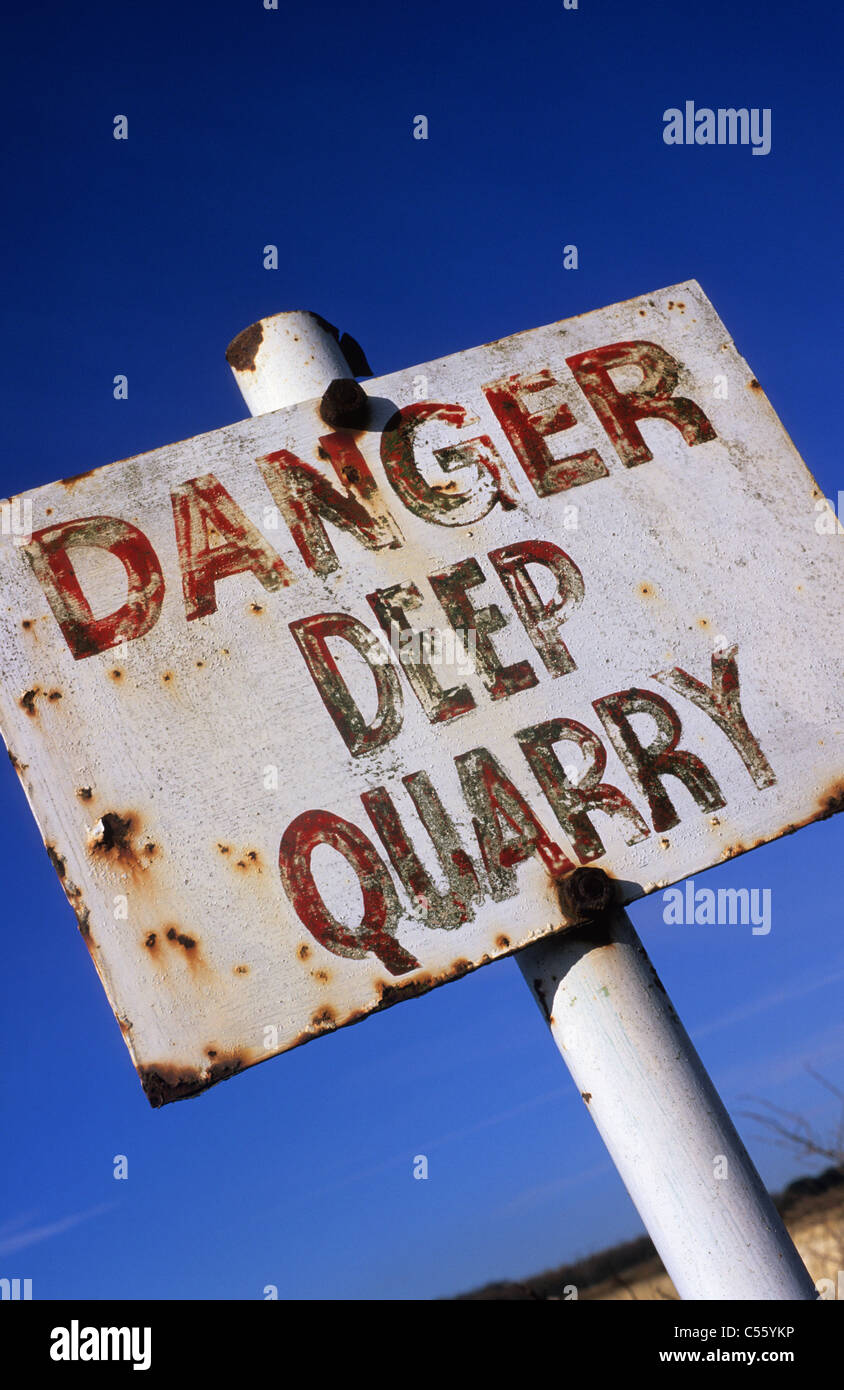 danger deep quarry warning sign at limestone quarry Yorkshire UK Stock Photo Alamy