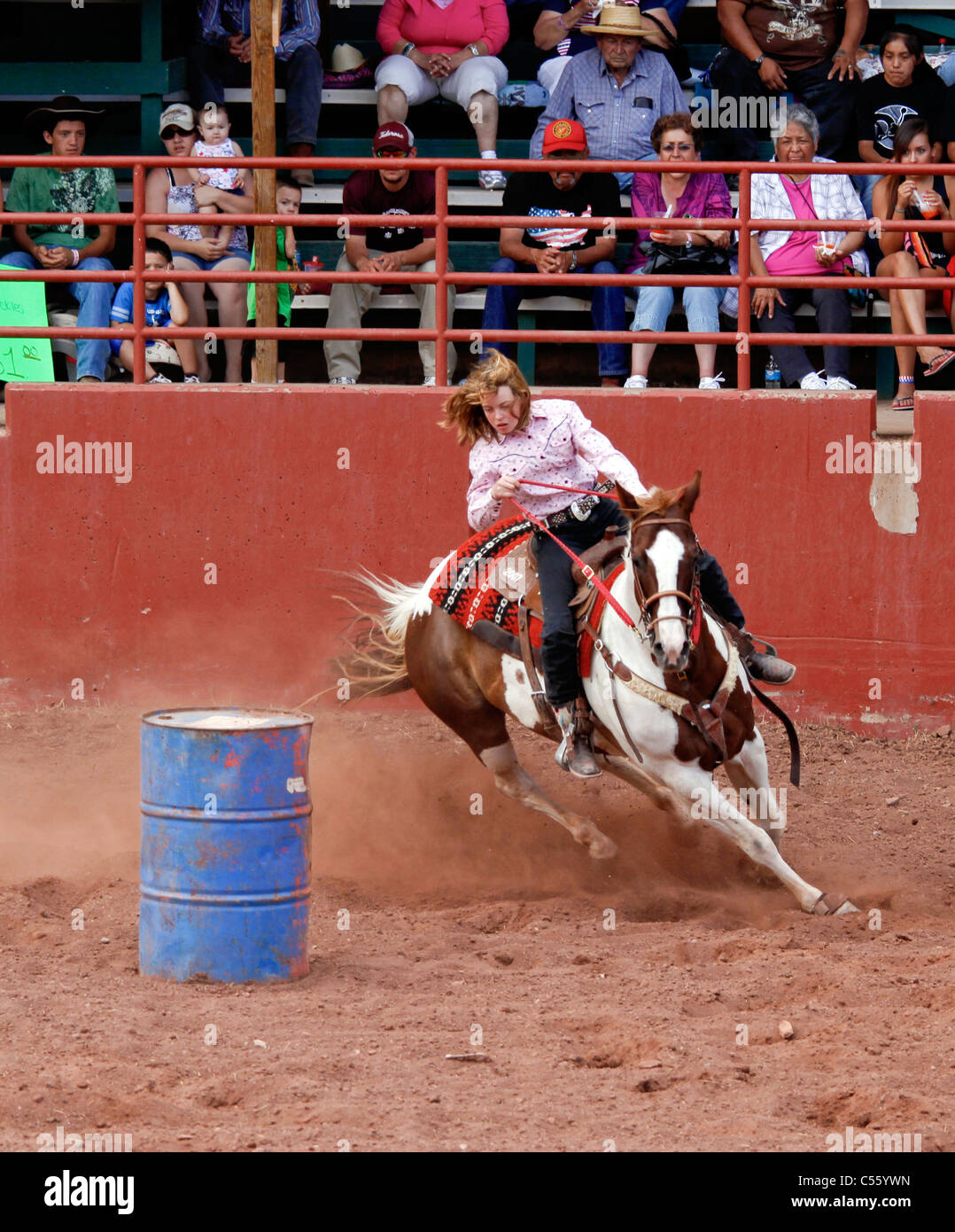 Woman competing in the barrel racing event at the Annual Indian Rodeo ...