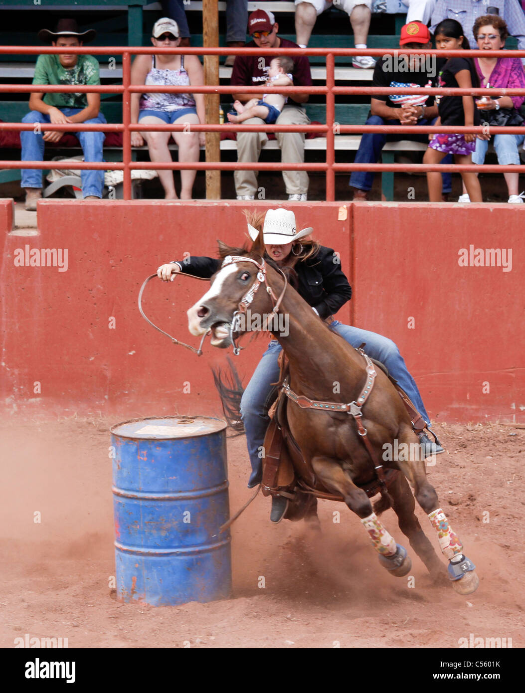 Woman competing in the barrel racing event at the Annual Indian Rodeo ...