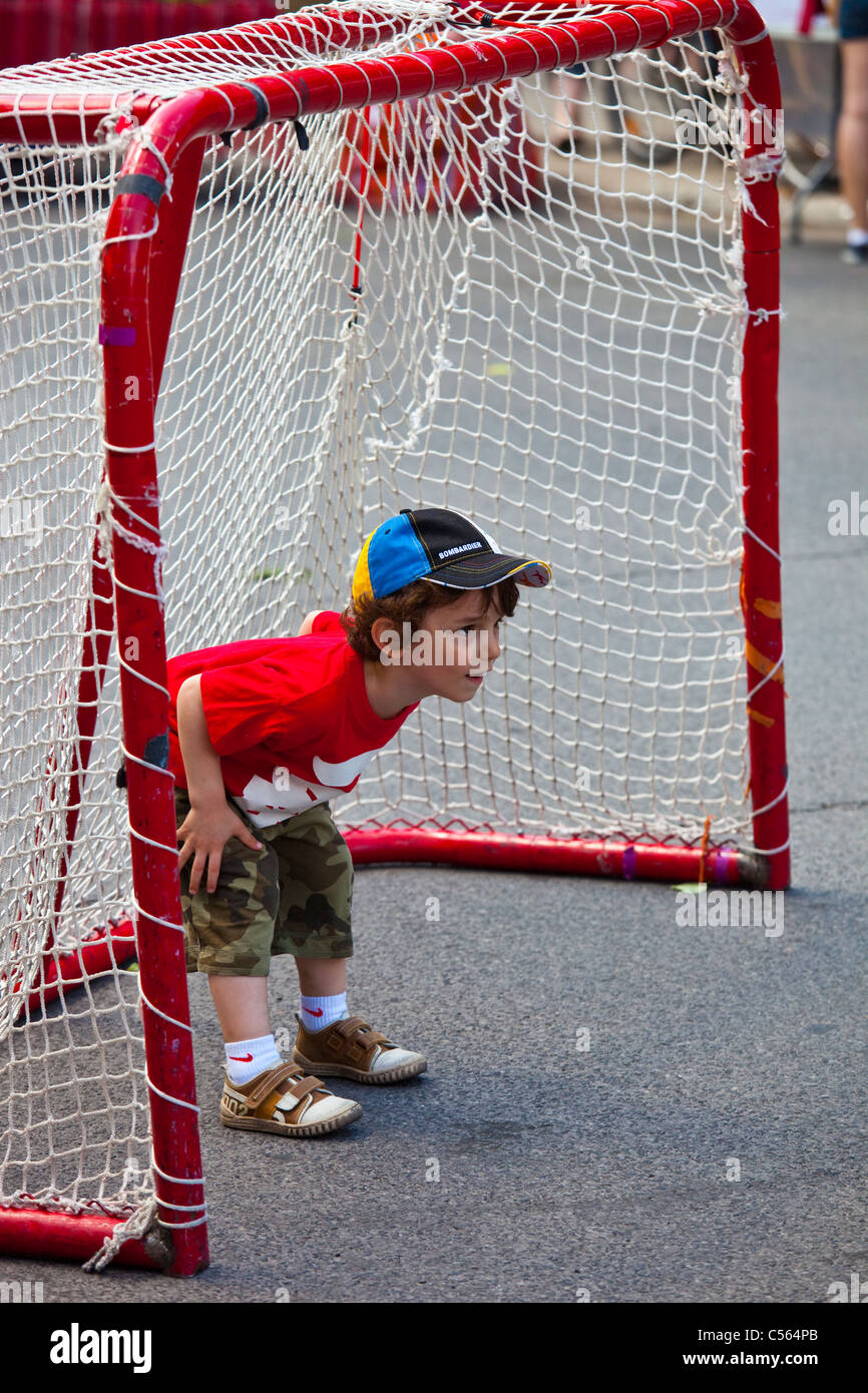 Boy playing football (soccer) in Montreal, Canada Stock Photo Alamy