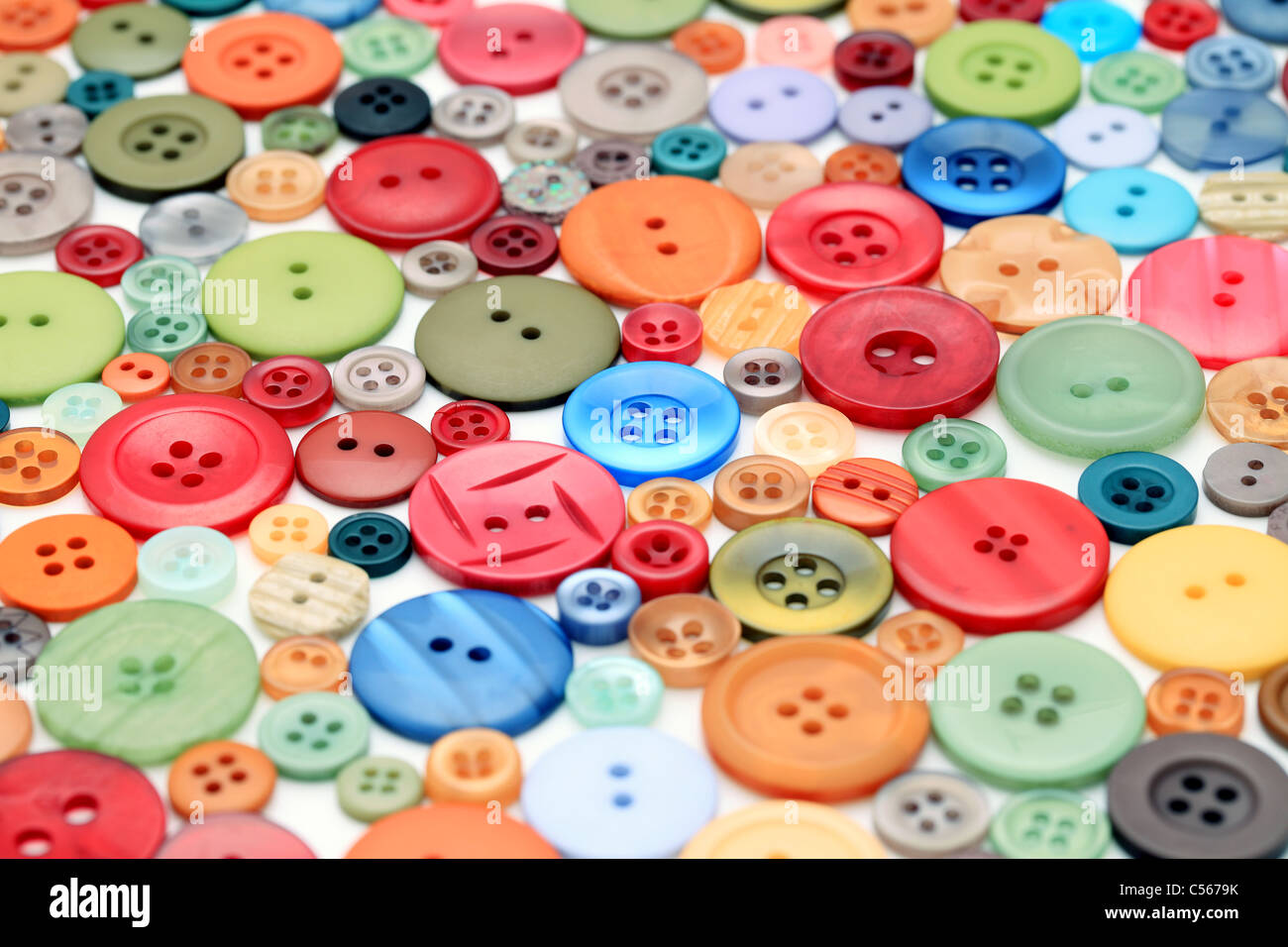 Colorful buttons on white background Stock Photo - Alamy