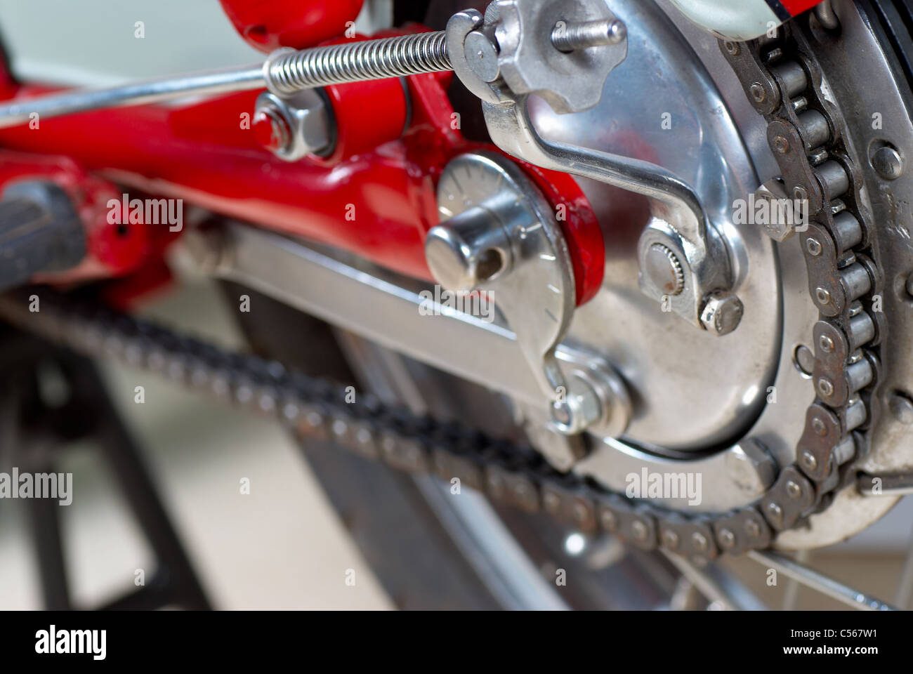 Detail of chain drive and rear brake of a vintage motorcycle, chain
