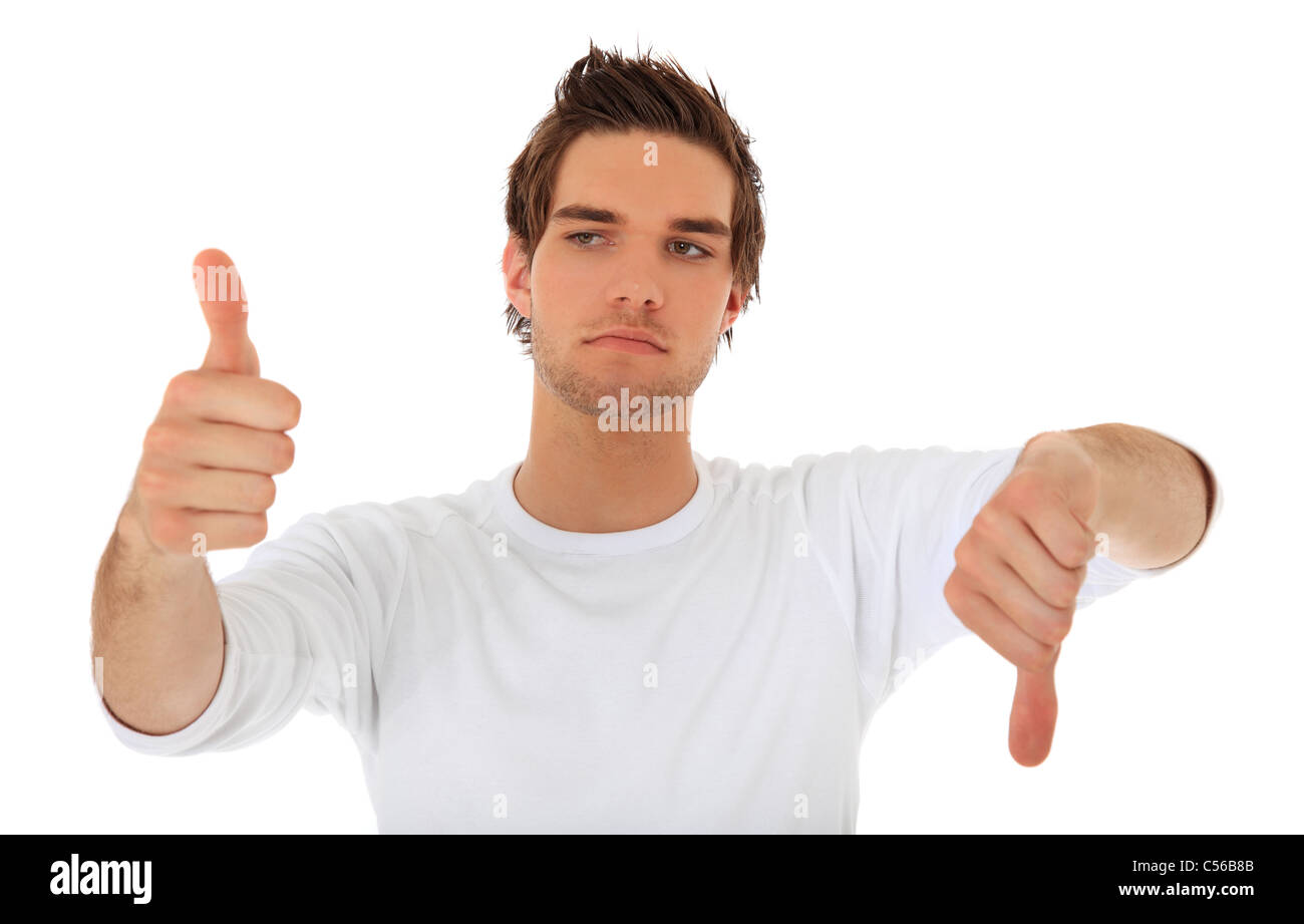 Attractive young man showing thumbs up and thumbs down. All on white background. Stock Photo