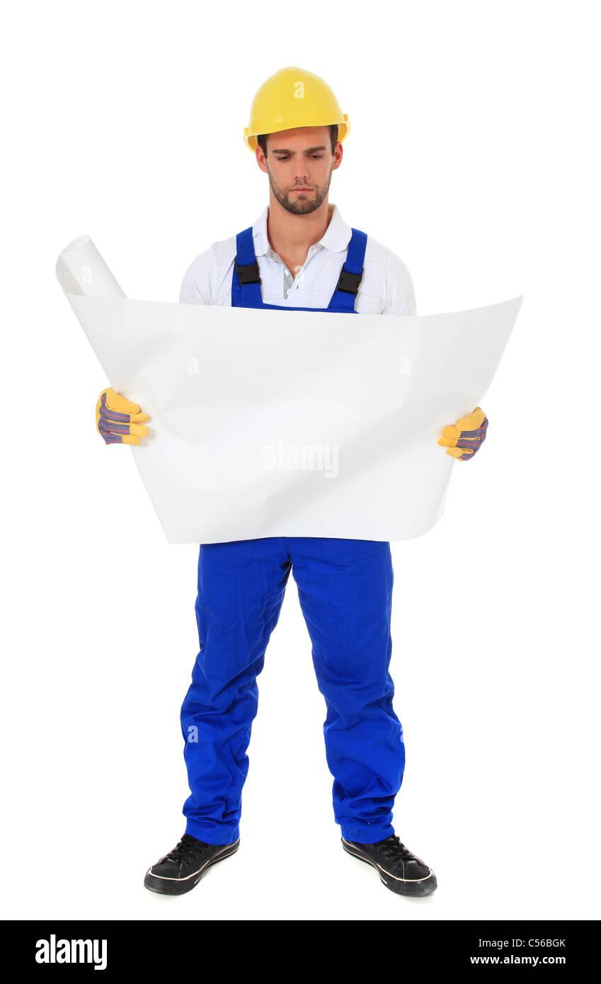 Manual worker studying construction plan. All on white background. Stock Photo