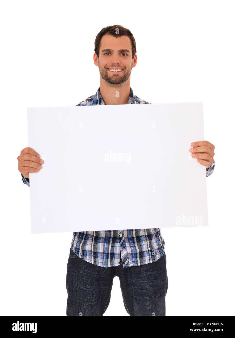 Young man holding blank sign. All on white background. Stock Photo