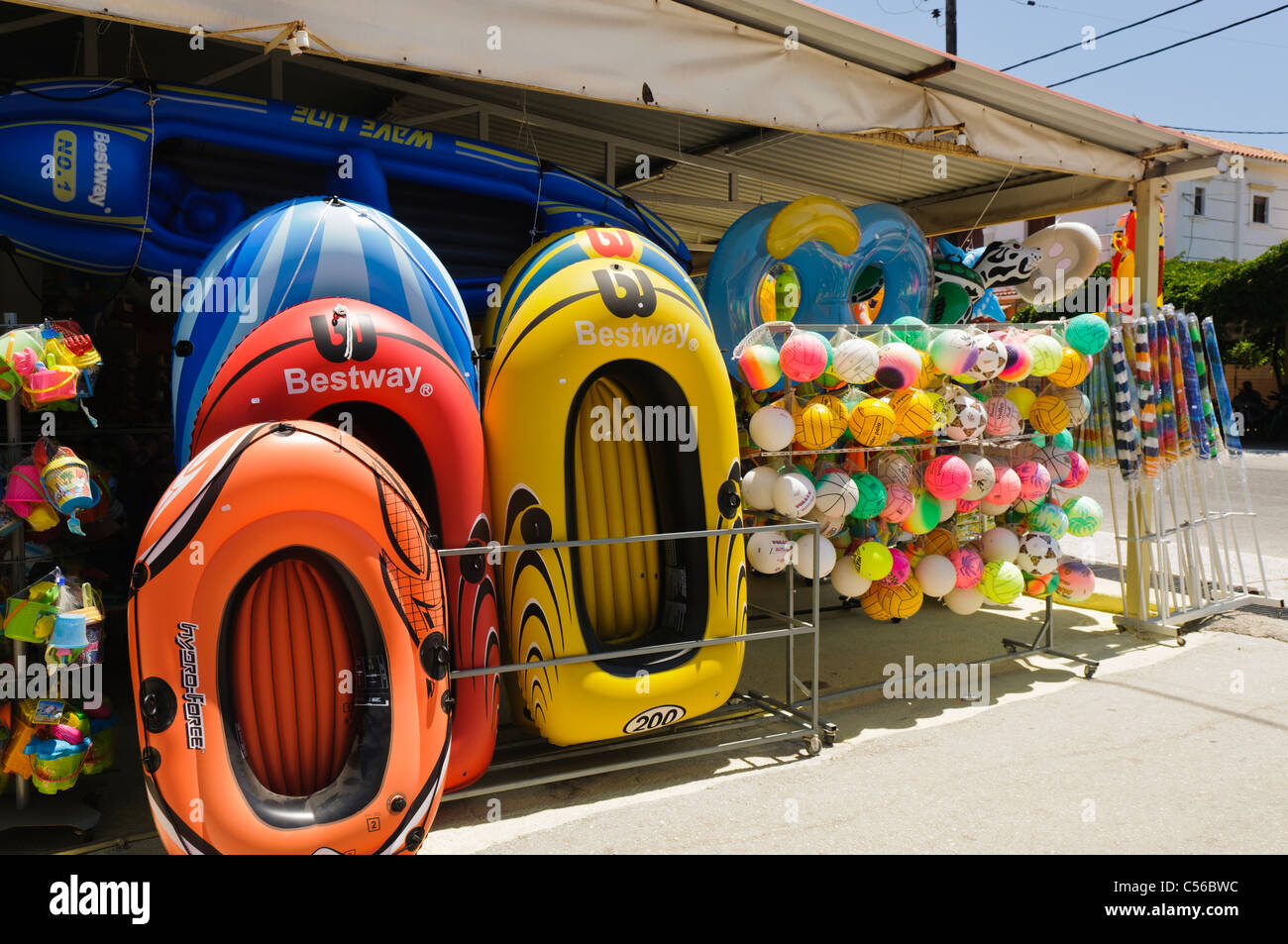 Shop by a beach selling inflatable boats and toys Stock Photo