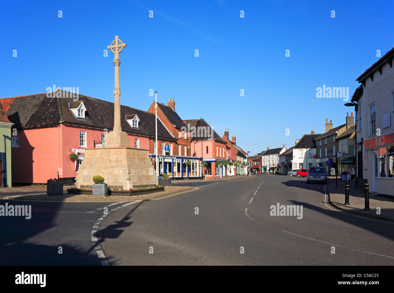 A view of the centre of Holt, Norfolk, England, United Kingdom, from the west end by the war memorial. Stock Photo