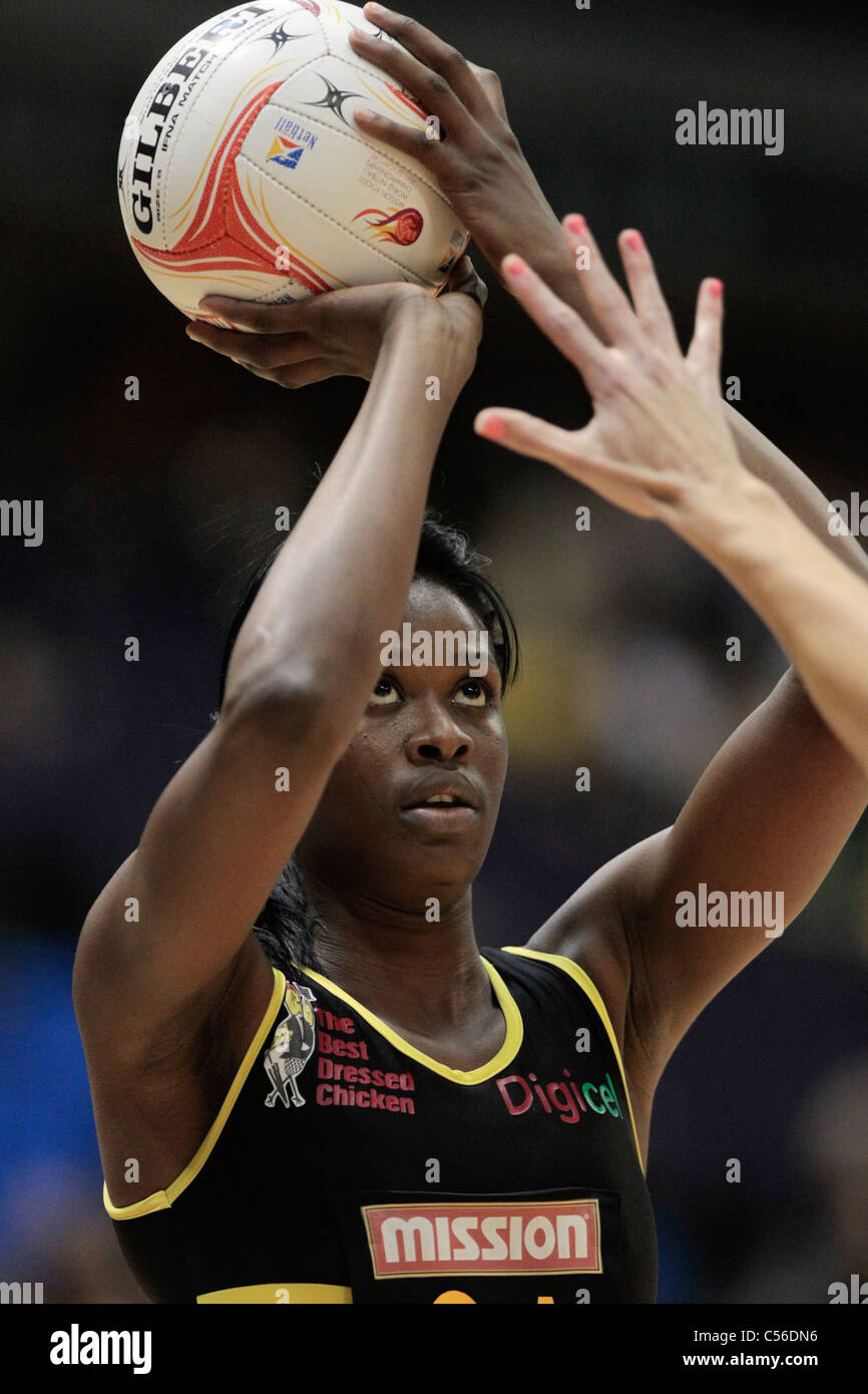 09.07.2011 Romelda Aiken of Jamaica attempts a shot during the Semi-finals between Australia and Jamaica, Mission Foods World Netball Championships 2011 from the Singapore Indoor Stadium in Singapore. Stock Photo