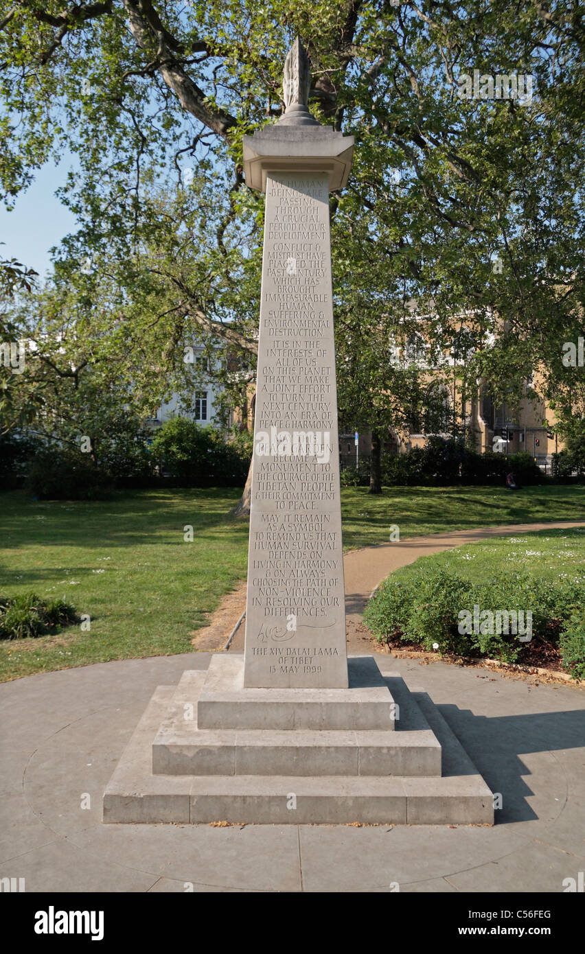 Pillar inscribed with a message from the Dalai Lama (unveiled May 1999) in the grounds of the Imperial War Museum, London. Stock Photo