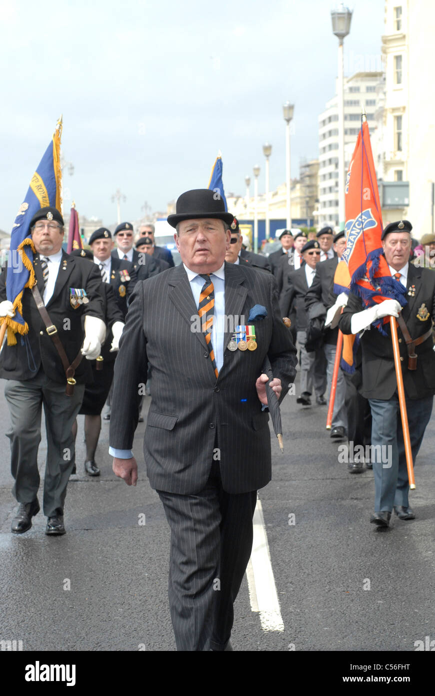 World War Two veterans march with soldiers of the 2nd Battalion The Princess of Wales's Royal Regiment  parade in Brighton. UK. Stock Photo